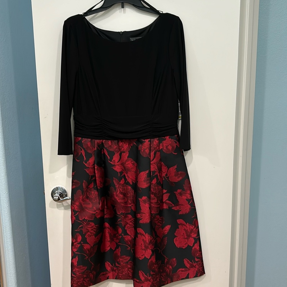 Beautiful cocktail dress. Black and red. New with tags.